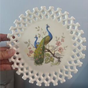 MCM vintage decorative plate features a hand-painted peacock